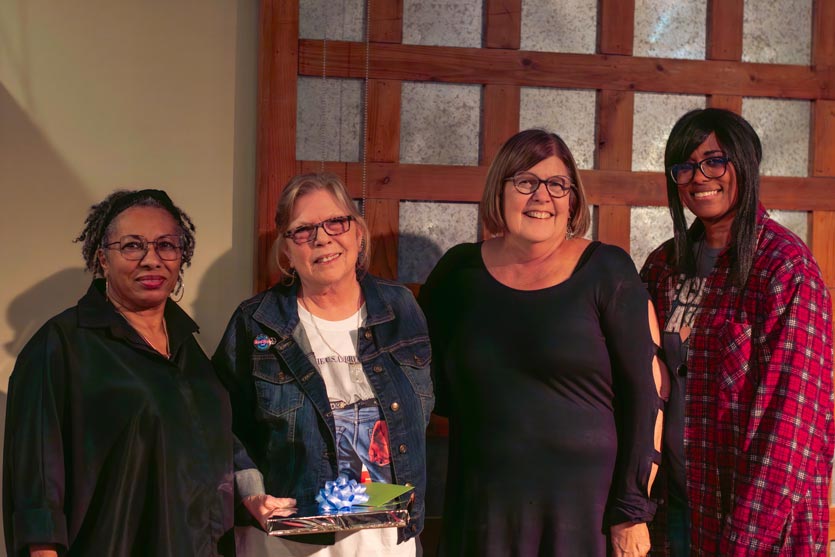 Janice Watts, VNA's 2024 Employee of the Year, with the rest of VNA's Human Resources Team